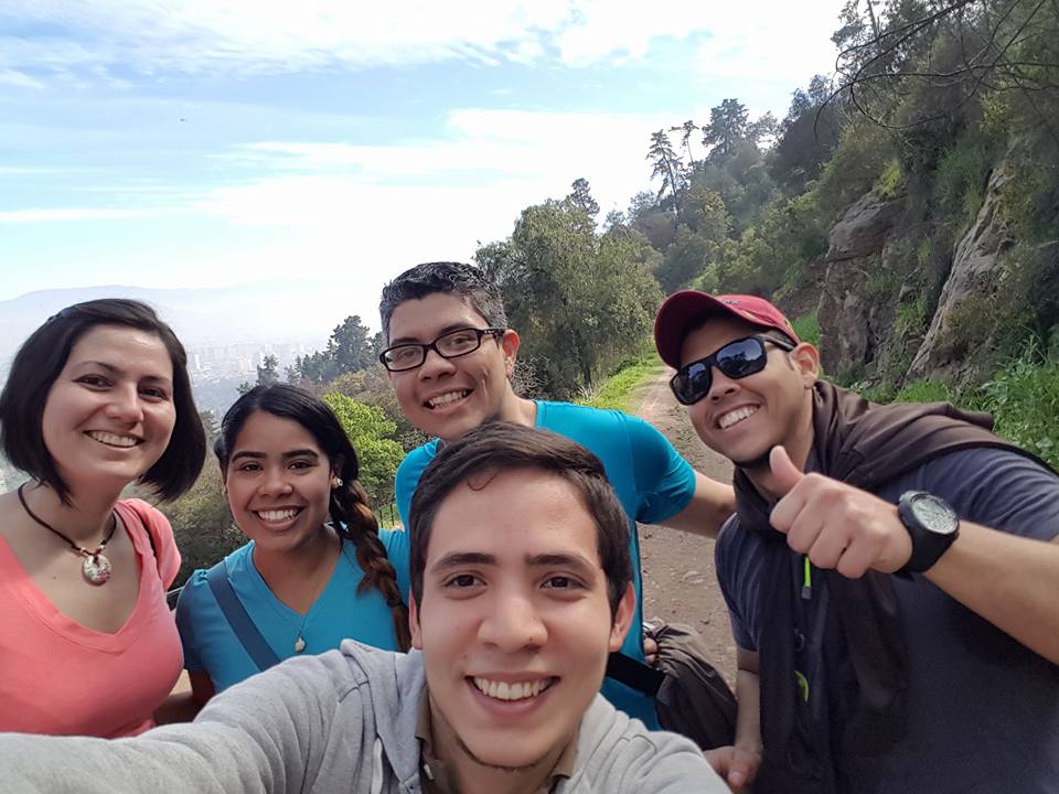 Juan Delgadillo (middle bottom) and friends hiking the San Cristobal Hill at Santiago, Chile